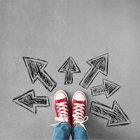 Feet in red sneakers surrounded by arrows